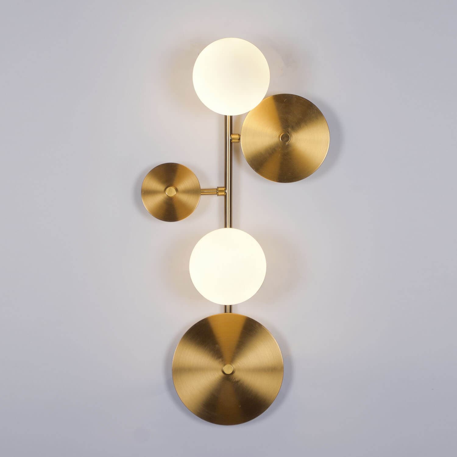Arbor Wall Light, A branching sconce that washes texture up the wall.